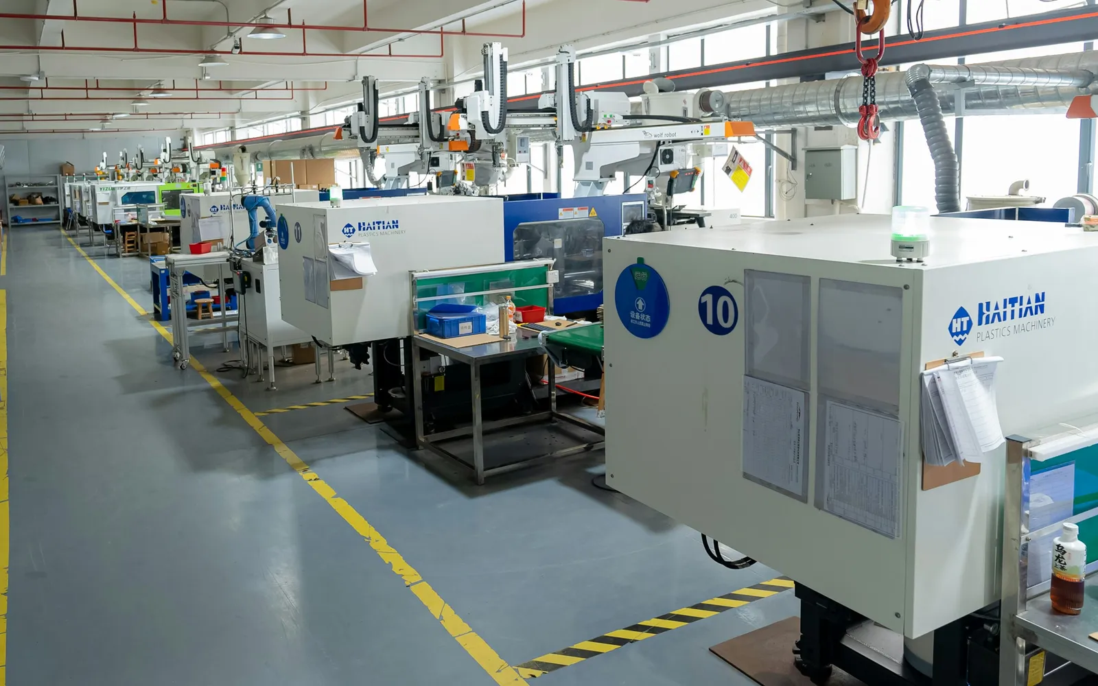Injection moulding machine on a production floor
